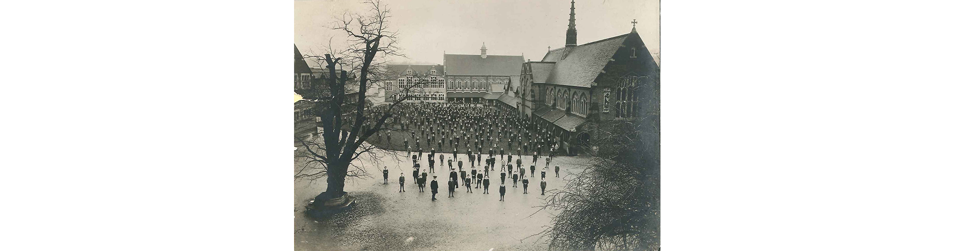 Dr T. C. Fry (Headmaster 1888-1911) and pupils on the occasion of the 400th boy admitted to the school in 1905.
"His name is wrapped in obscurity, but he has deserved well already of his fellows, for have we not enjoyed a whole holiday in his honour".
